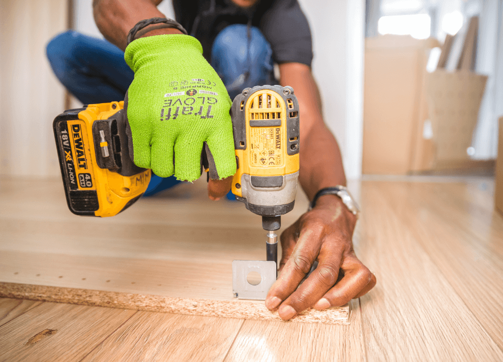 Our carpenter installing custom built-in cabinets in a Dubai Marina apartment living room